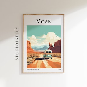 May include: A vintage teal and white van drives down a red dirt road in a desert landscape with red rock formations. The text "MOAB" is at the top of the image, and the coordinates "38.7331° N, 109.5925° W" and "Utah" are at the bottom.