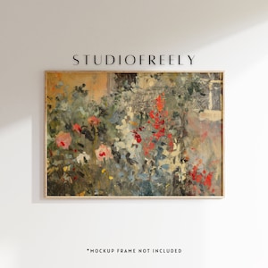 Op de afbeelding: Een ingelijst schilderij van een tuinscène met een verscheidenheid aan bloemen in tinten rood, roze en wit. De bloemen zijn geschilderd in een losse, impressionistische stijl, en de achtergrond is een zacht, gedempt groen.