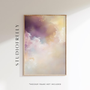 May include: Abstract painting in a wooden frame with a soft, dreamy, and colorful design. The painting features a blend of purple, pink, yellow, and white hues, creating a sense of ethereal beauty.