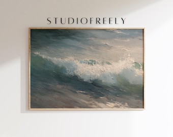 May include: A framed art print depicting a seascape with a crashing wave. The artwork features shades of blue, gray, and white, with the text "STUDIOFREELY" at the top. The frame is a light wood color. The text "*MOCKUP FRAME NOT INCLUDED" is at the bottom.