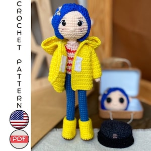 May include: Crochet pattern for a yellow raincoat doll with blue hair and a red and white striped shirt. The doll is holding a small suitcase with a blue and white interior. The pattern is available as a PDF download.