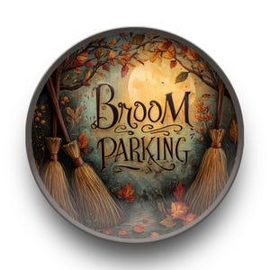 May include: Round decorative sign with the words "Broom Parking" in elegant script. The sign features a whimsical autumn scene with three brooms, fall foliage, and a full moon. The color palette includes warm tones of brown, orange, and green.