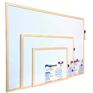May include: Four white magnetic dry-erase whiteboards with natural wood frames. The whiteboards are of varying sizes, with the largest at the back and the smallest at the front. Each board has a pen holder and magnetic markers.