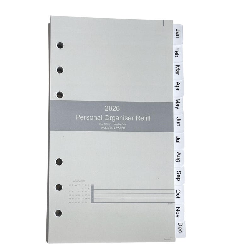May include: A light gray 2026 personal organizer refill with monthly tabs. The refill features a calendar and is designed with week-on-two-pages layout. The tabs are labeled with the months of the year.