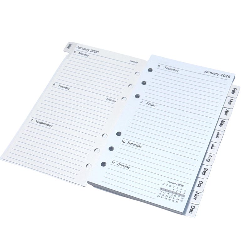 May include: Open white planner pages with the text "January 2026" visible. The planner is open to the week of January 5th, with days of the week labeled. A calendar for January 2026 is at the bottom of the right page. Tabs for the months are visible.