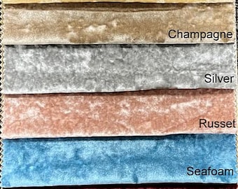 May include: A swatch card showing 12 different colors of velvet fabric. The colors are: White, Eggshell, Natural, Gold, Champagne, Silver, Russet, Seafoam, Maroon, Hunter, Navy, and Black.