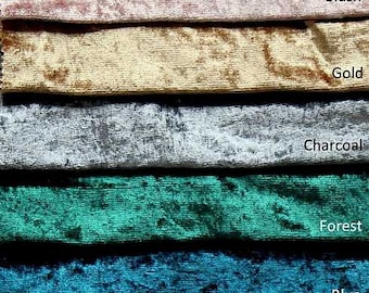 May include: A close-up of ten fabric swatches in various colors, including white, ivory, blush, gold, charcoal, forest green, blue, burgundy, navy, and black. The fabric has a crushed velvet texture.