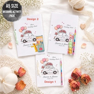 May include: A5 size wedding activity packs with a car illustration, balloons, and the word "Love". The packs include crayons and pens. The text reads "Lauren & James" and "Kim's Wedding Pack". Design 1 and Design 2 are visible.