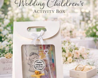 May include: A cream-colored paper gift bag with a handle and a clear window, tied with a white ribbon. Inside are activity items including a coloring book, a bubble wand, a small yellow figure, and a round sticker labeled Freddie's Activity Box.