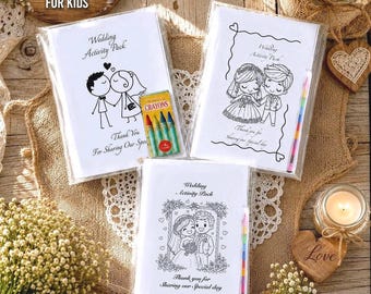 May include: Three A5 size wedding activity packs for kids in clear plastic packaging. Each pack features a white cover with black line art of a bride and groom, the text Wedding Activity Pack, and Thank You For Sharing Our Special Day.