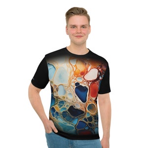 May include: A black t-shirt with a colorful abstract design featuring swirling patterns of blue, orange, yellow, and red.