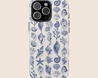 May include: White iPhone case with a blue and white seashell pattern. The case has a camera lens cutout and a cutout for the phone's buttons.