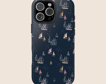 May include: A navy blue phone case with a white sailboat pattern. The case has a camera lens cutout and a white border around the edge.