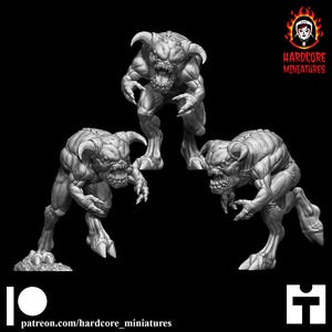 May include: Three gray miniature demon figures with horns, sharp teeth, and muscular bodies are displayed against a black background. The Hardcore Miniatures logo is in the upper right corner, and the Patreon link is at the bottom.