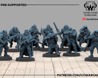 May include: A collection of pre-supported miniature figures, likely for tabletop gaming. The figures are clad in hooded cloaks and armor, holding weapons. The color is a muted blue-gray. The figures are on individual bases.