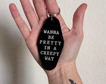 Bonita llave de motel de una manera espeluznante, llavero alternativo