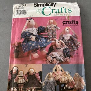 Simplicity Crafts 7651. Clothes for purchased doll.  Uncut. Circa 1991.