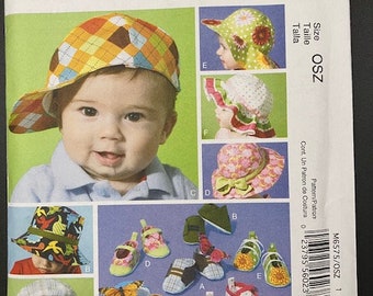 McCalls pattern 6575. Uncut. Baby hats, sunhats and shoes. Boy and girl.