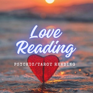 May include: A red heart-shaped object stands on a wet surface at sunset. The text "Love Reading" appears in white script above the heart, and the text "PSYCHIC/TAROT READING" is printed in white capital letters below the heart shape.