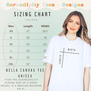May include: Sizing chart for a Bella Canvas unisex tee, showing measurements in inches for XS, S, M, L, XL, and 2XL sizes. The chart shows length and width measurements for each size. The model is wearing a medium size and is shown wearing an XL size.