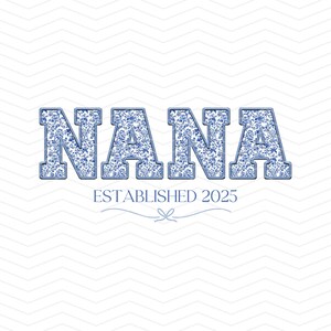 May include: Blue and white floral patterned text that reads "NANA ESTABLISHED 2025" on a white chevron background.