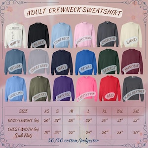 May include: A size chart for adult crewneck sweatshirts in various colors, including white, black, light blue, light pink, indigo, charcoal, sport grey, sand, navy, royal, forest, maroon, carolina, military, purple, safety pink, red, and dark heather. The chart shows the body length and chest width in inches for sizes XS through 3XL.
