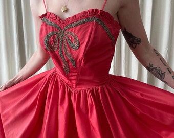 1940s gown with trompe l'oeil bow detail