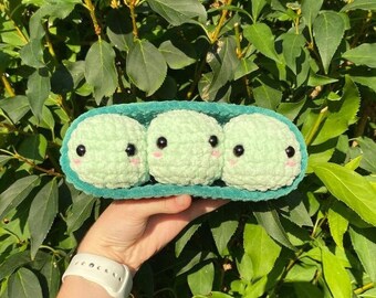 Crochet fait à la main Trois pois dans une peluche à dosettes