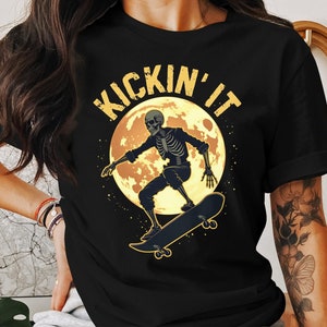 Vintage Skeleton Skateboarder Graphic Tee - Halloween Skater Shirt