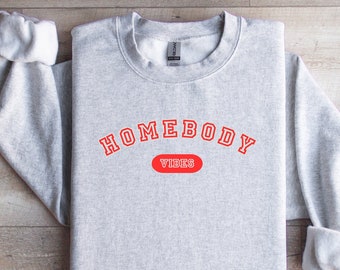 Bluza Homebody Vibes: unisex, kanapowy, okrągły dekolt