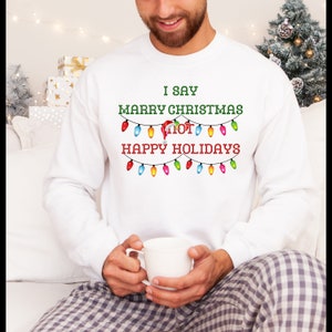 Merry Christmas not Happy Holidays shirt, non woke Christmas, Offensive Christmas Unisex Heavy Blend™ Crewneck Sweatshirt