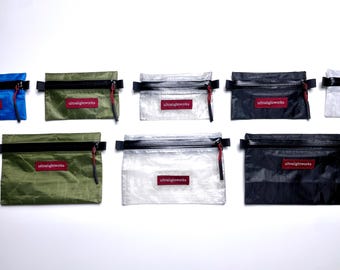Portefeuille Trail Wallet en Dyneema® – Portefeuille minimaliste ultraléger disponible en plusieurs couleurs et tailles pour la randonnée, le trekking et le quotidien.