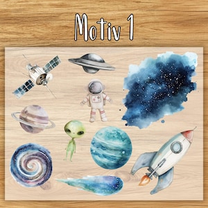 May include: A collection of watercolor illustrations featuring space-themed elements. Includes a satellite, a UFO, an astronaut, planets, an alien, a rocket ship, a galaxy, and a comet, all set against a wooden background. The text "Motiv 1" is at the top.