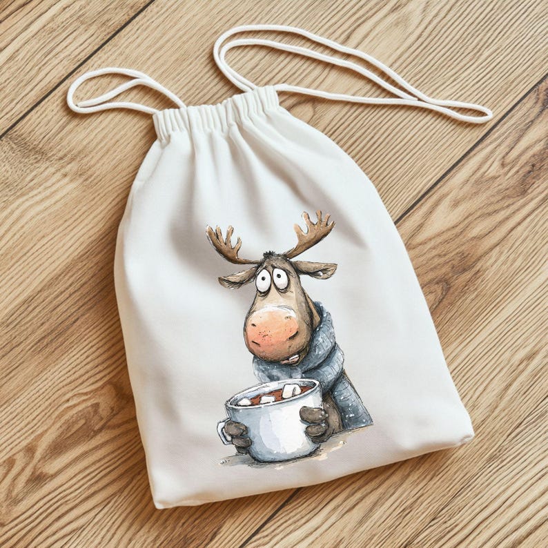 May include: A white drawstring bag featuring a cartoon moose with large eyes, wearing a blue scarf, and holding a mug of hot chocolate with marshmallows. The bag has a white drawstring closure.