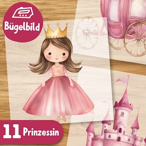 Pode incluir: Design de transferência para passar a ferro com uma princesa com um vestido rosa e uma coroa dourada. O design também inclui uma carruagem rosa e um castelo rosa. O texto "11 Prinzessin" está na parte inferior da imagem.