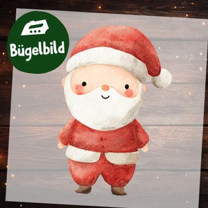 Pode incluir: Ilustração em aquarela do Papai Noel em traje e chapéu vermelhos, com barba e acabamentos brancos. A imagem inclui o texto "Bügelbild" em um círculo verde.
