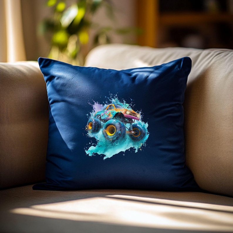 May include: Navy blue square throw pillow featuring a colorful watercolor illustration of a monster truck. The truck has large wheels and is depicted on a splash of blue paint. The pillow is made of a soft, velvety material.