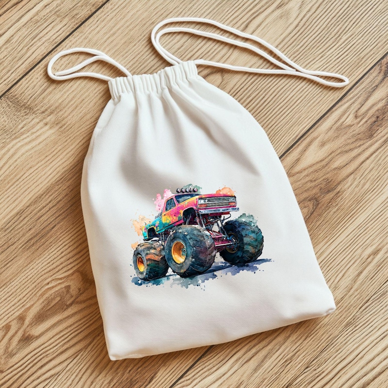May include: White drawstring bag featuring a colorful watercolor illustration of a monster truck. The truck has large tires and is painted with rainbow hues. The bag is made of a soft, white fabric and has a drawstring closure.