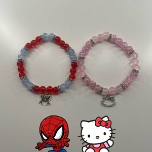 spiderman + hello kitty duo >>> shop my  for these bracelets: 'bea