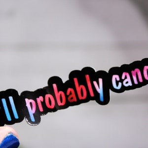 May include: A black sticker with the text "I'll probably cancel" in rainbow colors.