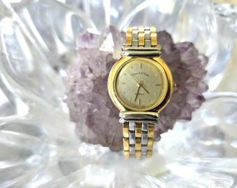 Reloj vintage de cuarzo bicolor para mujer de Oscar De La Renta