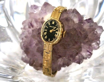 Vintage 1979 Bulova Petite Woman's Watch N9 17 jewel manual wind Black Dial