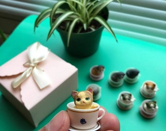 8 teacup cats, each 2 cm tall, in a gift box by RenemramirezUS
