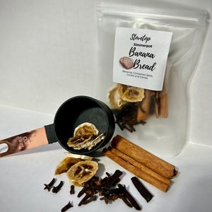 May include: Stovetop simmerpot kit for banana bread. The kit includes dried banana slices, cinnamon sticks, vanilla beans, and cloves.
