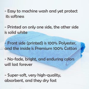 May include: A folded, light blue towel. Text on the image states: "Easy to machine wash and yet protect its softness", "Printed on only one side, the other side is solid white", "Front side (printed) is 100% Polyester, and the inside is Premium 100% Cotton".