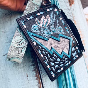 Minicartera turquesa con forma de rayo