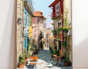 May include: Watercolor painting of a European street scene. The artwork depicts a narrow cobblestone street lined with colorful buildings in shades of yellow, pink, blue, and red. Tables and chairs are set up outside, and potted plants add greenery.