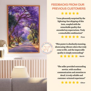 May include: A framed art print featuring a watercolor painting of a tree-lined street with purple flowering trees. The artwork has a warm wooden frame. The print is from Travel House Design California USA.