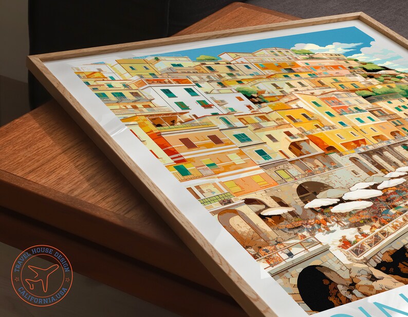 May include: A colourful illustration of a seaside town with buildings stacked on top of each other. The buildings are painted in shades of yellow, orange, red, and green. There are people walking around the town and umbrellas on the street.