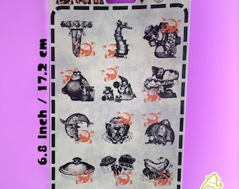 Könnte beinhalten: Ein Bogen mit 12 schwarz-weißen Aufklebern mit verschiedenen Comicfiguren. Die Aufkleber befinden sich auf einem weißen Hintergrund mit schwarzem Rand. Der Bogen misst 17,2 cm x 43,2 cm.